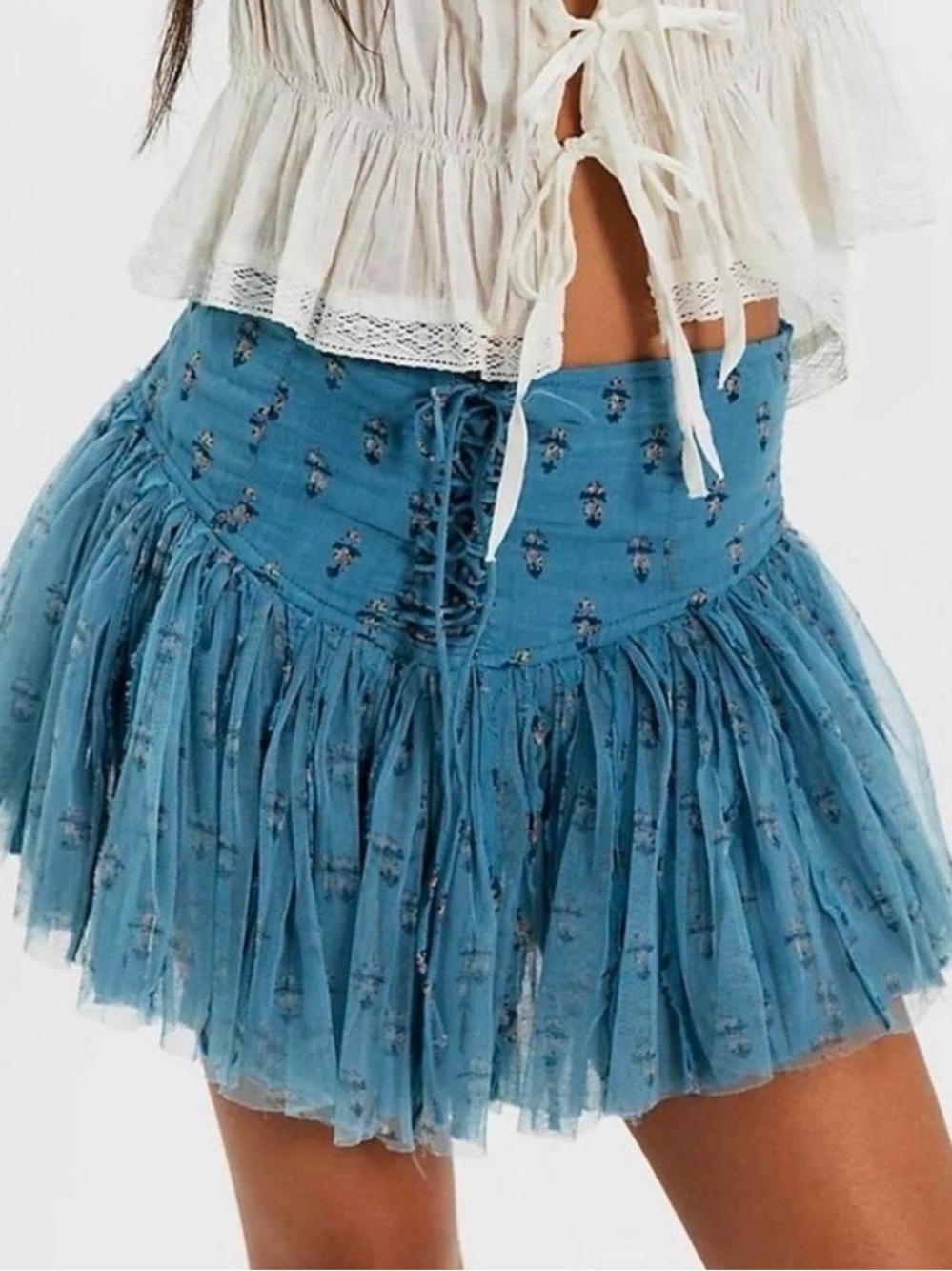Free People blue floral mini skirt with adorable lace up detail! size L NWOT